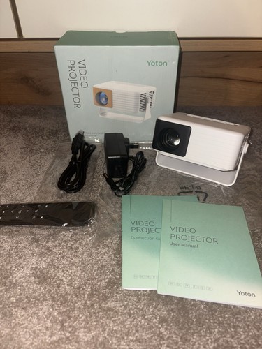 New yoton mini projector - new,